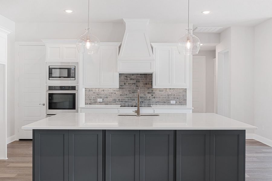 Representative furnished interior of a home built from the The Braden II by Doug Parr Custom Homes in Kessler Farms, Brock (Image 5).