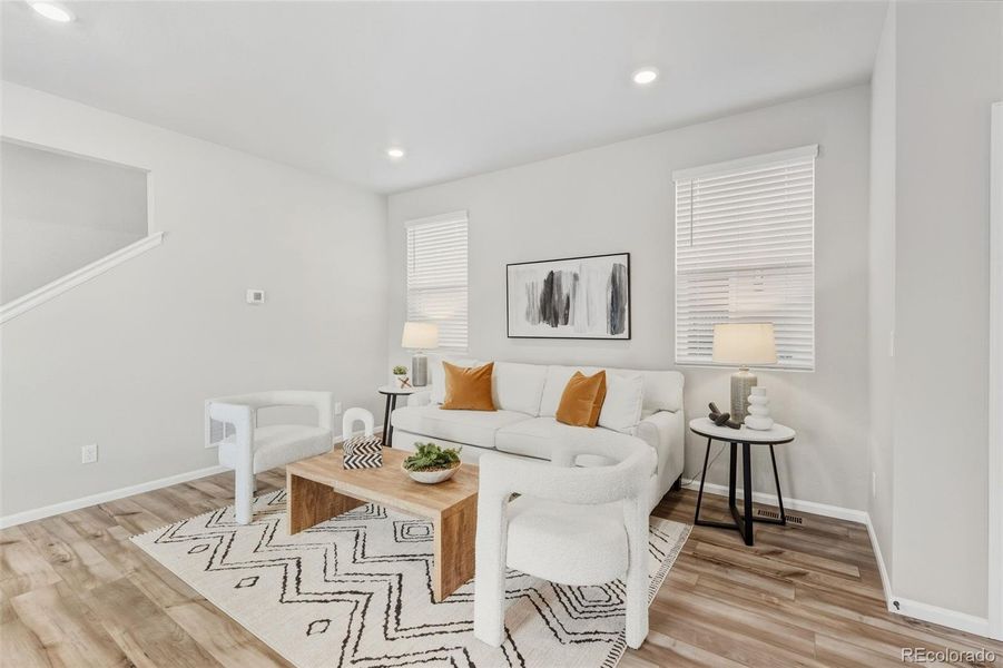 Furnished interior view inside a new home in Woodrose at Painted Prairie, Aurora (Image 13).