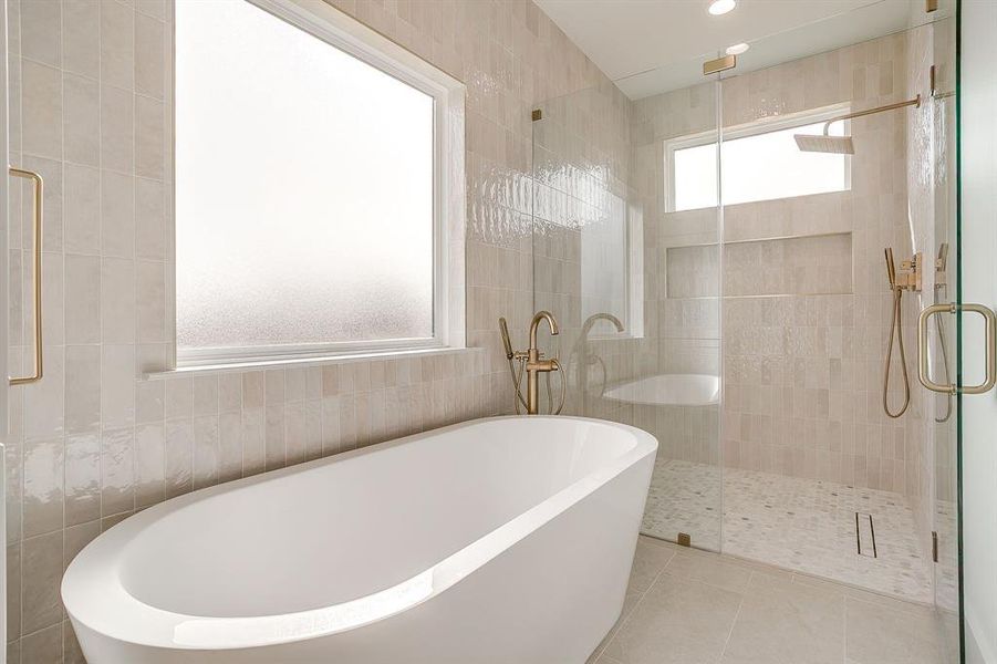 Massive soaking tub in primary