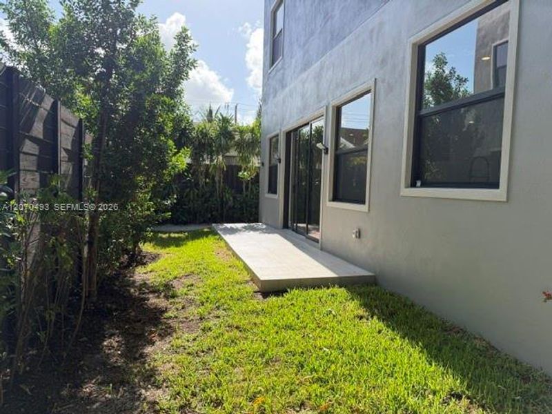 Exterior details and patio area of a home in , Miami (Image 3). Exterior details and patio area of a home in , Miami (Image 3).
