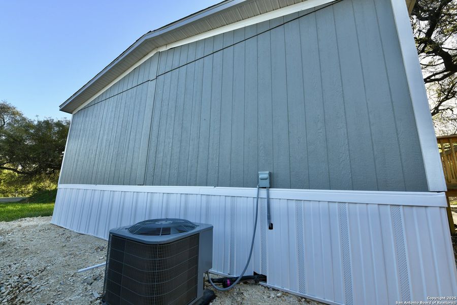 Front exterior of a new home in , San Antonio, TX, highlighting curb appeal (Image 25).