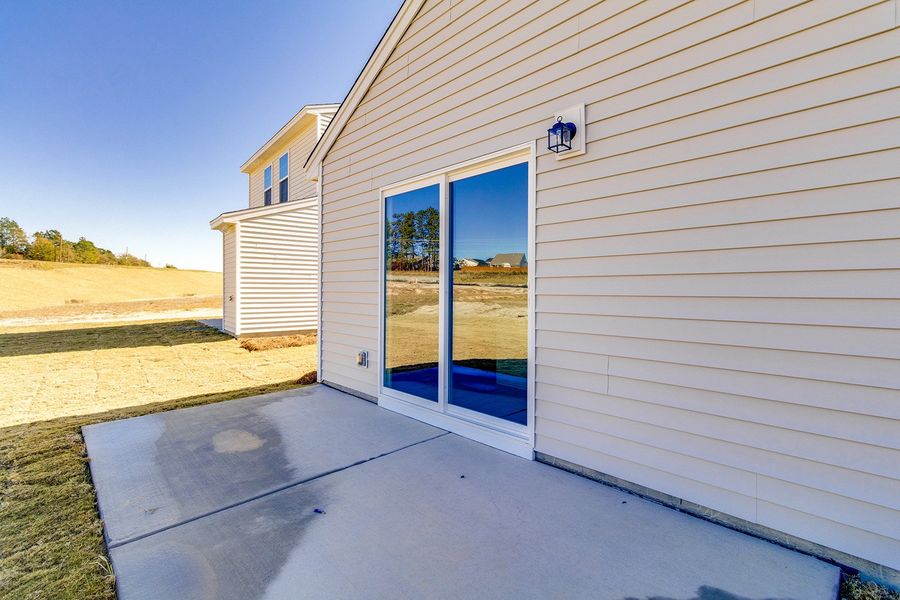 Exterior details and patio area of a home in Bluefield, Lexington (Image 3). Exterior details and patio area of a home in Bluefield, Lexington (Image 3).