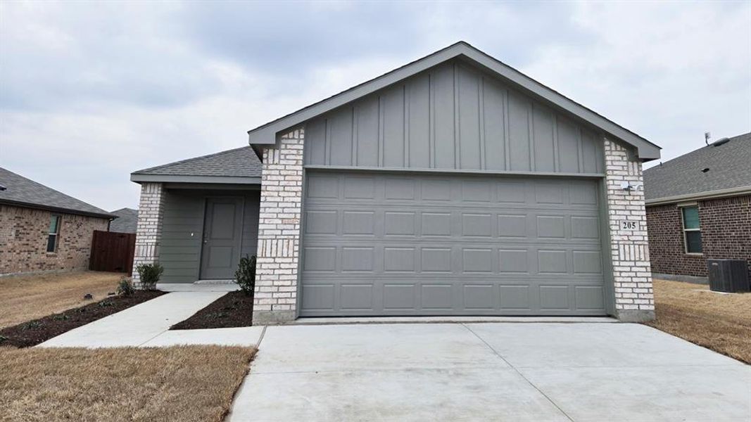 Front exterior of a new home in Leonard Crossing, Leonard, TX, highlighting curb appeal (Image 2). Front exterior of a new home in Leonard Crossing, Leonard, TX, highlighting curb appeal (Image 2).