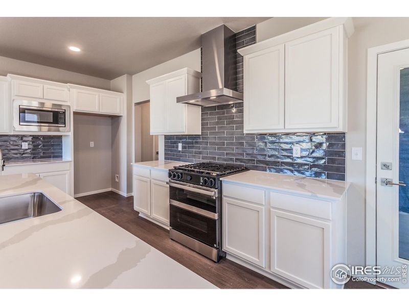 Furnished interior view inside a new home in Trailside Alley Load - Single Family Homes, Timnath (Image 6).