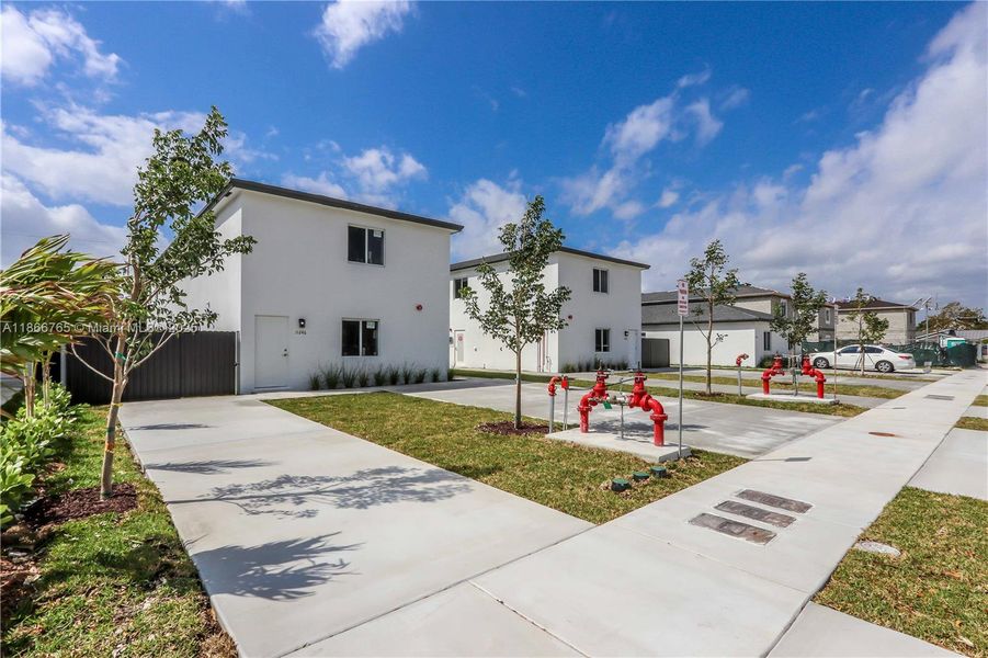 Front exterior of a new home in , Miami, FL, highlighting curb appeal (Image 20).