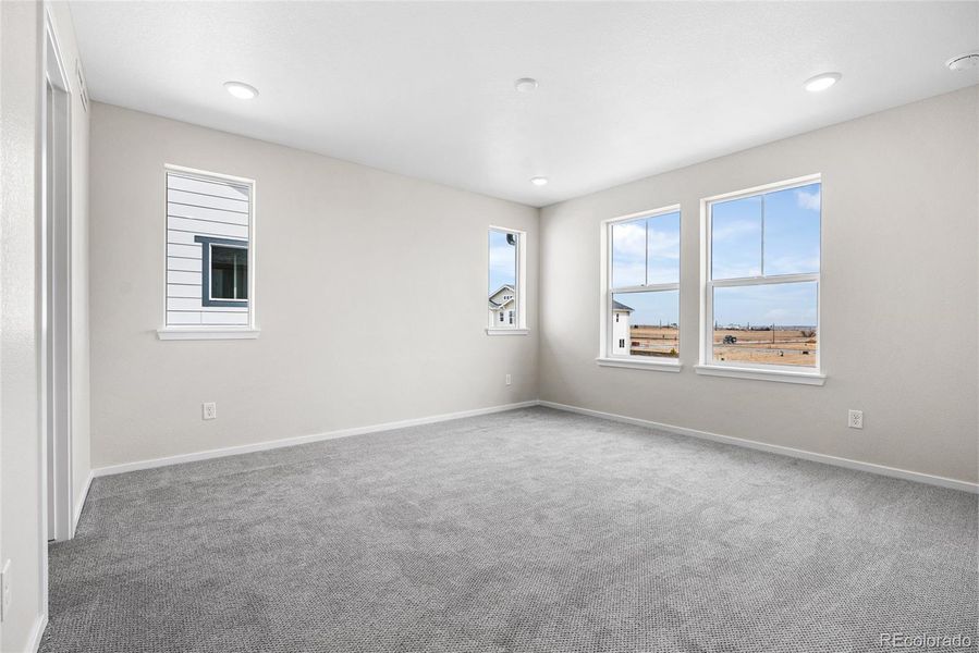 Spacious, unfurnished interior of a new home in Barefoot Village, Firestone (Image 25).