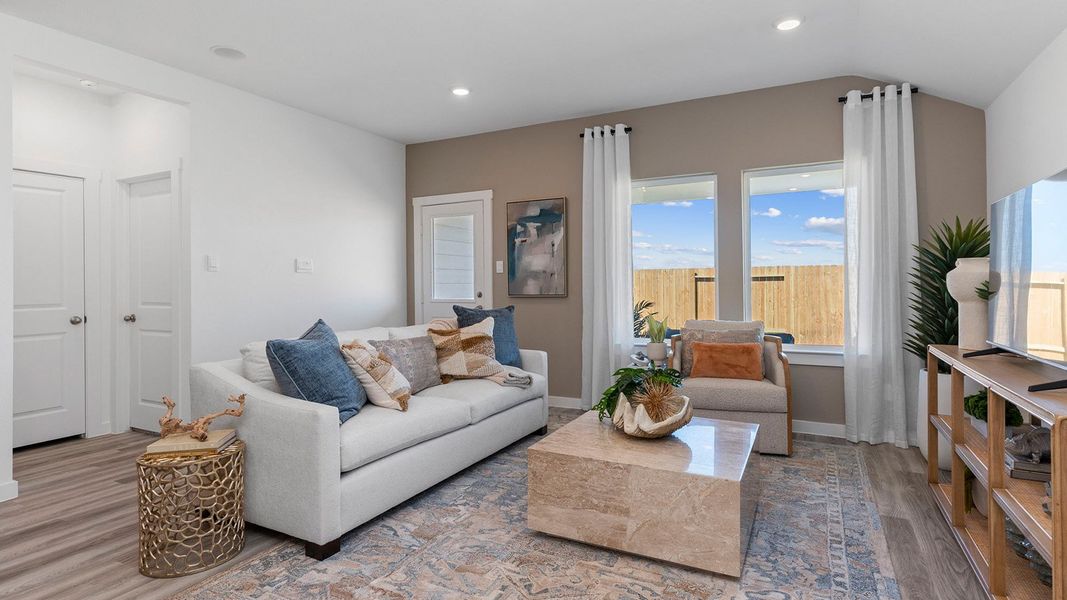 Furnished interior view inside a new home in Caldwell Crossing, Iowa Colony (Image 6).