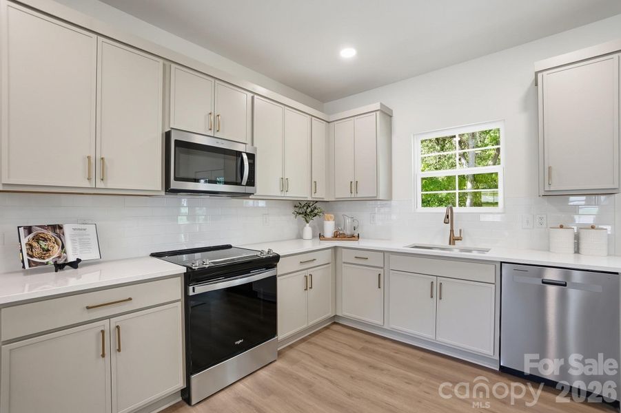 Quartz Countertops, Light Gray Shaker Cabinets