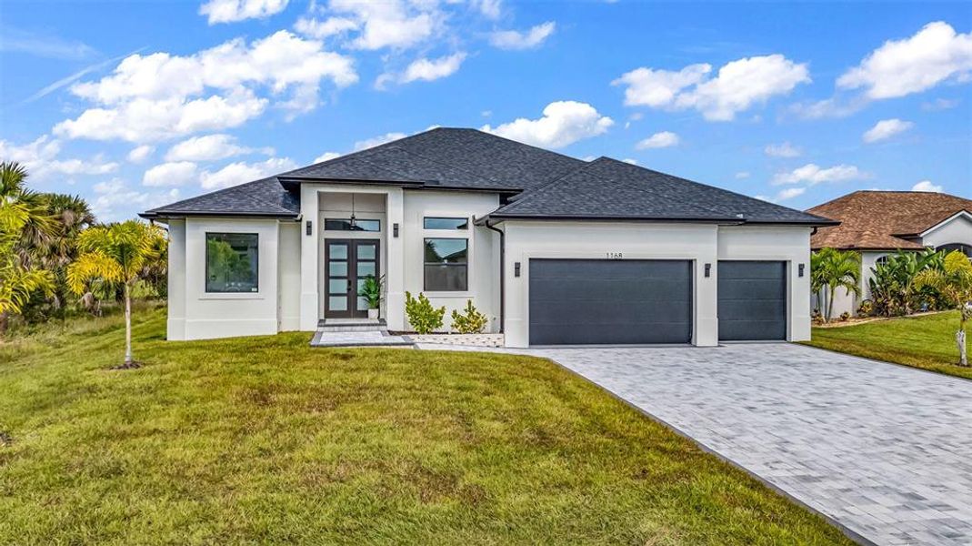 Front exterior of a new home in , Rotonda West, FL, highlighting curb appeal (Image 33). Front exterior of a new home in , Rotonda West, FL, highlighting curb appeal (Image 33).
