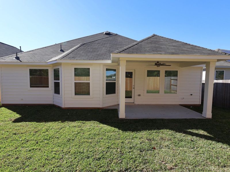 Exterior details and patio area of a home in Moran Ranch, Willis (Image 21).