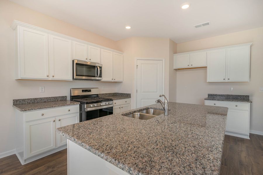 Representative furnished interior of a home built from the HAYDEN by D.R. Horton in Island Green, Myrtle Beach (Image 10).