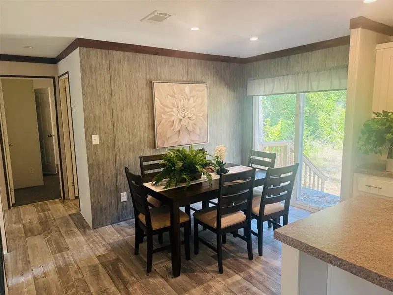 Furnished interior view inside a new home in , Fort White (Image 13).