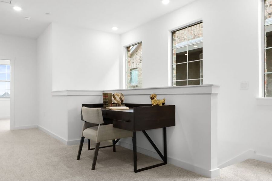 Furnished interior view inside a new home in The Tribute, The Colony (Image 10).