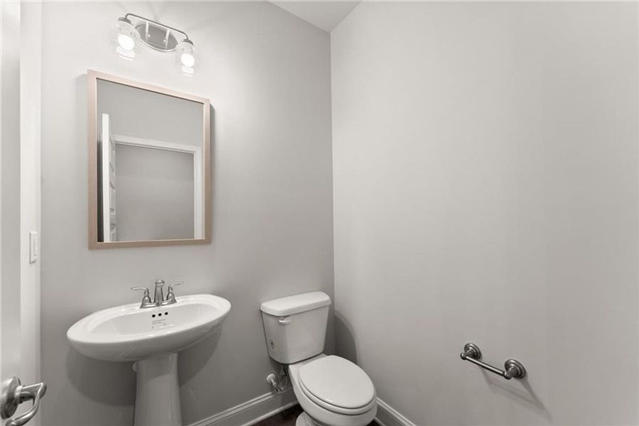Furnished interior view inside a new home in Wood Creek Landing, Leland (Image 7).