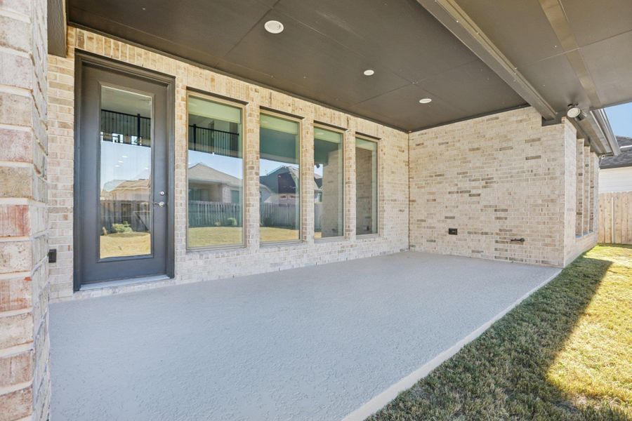 Exterior details and patio area of a home in , Leander (Image 3).