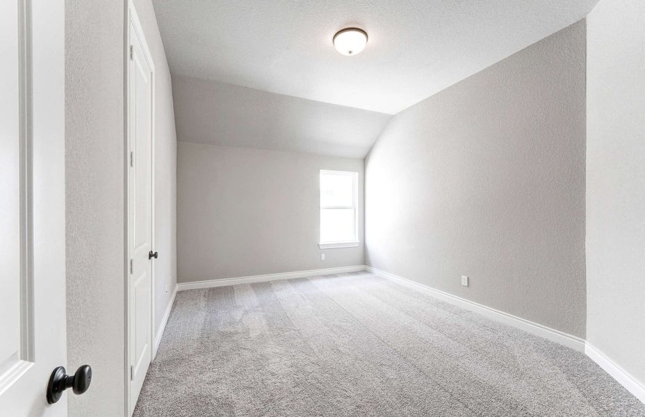 Representative unfurnished interior of a home built from the 2870 by Ravenna Homes in The Woodlands Hills 65′, Willis (Image 37). Representative unfurnished interior of a home built from the 2870 by Ravenna Homes in The Woodlands Hills 65′, Willis (Image 37).