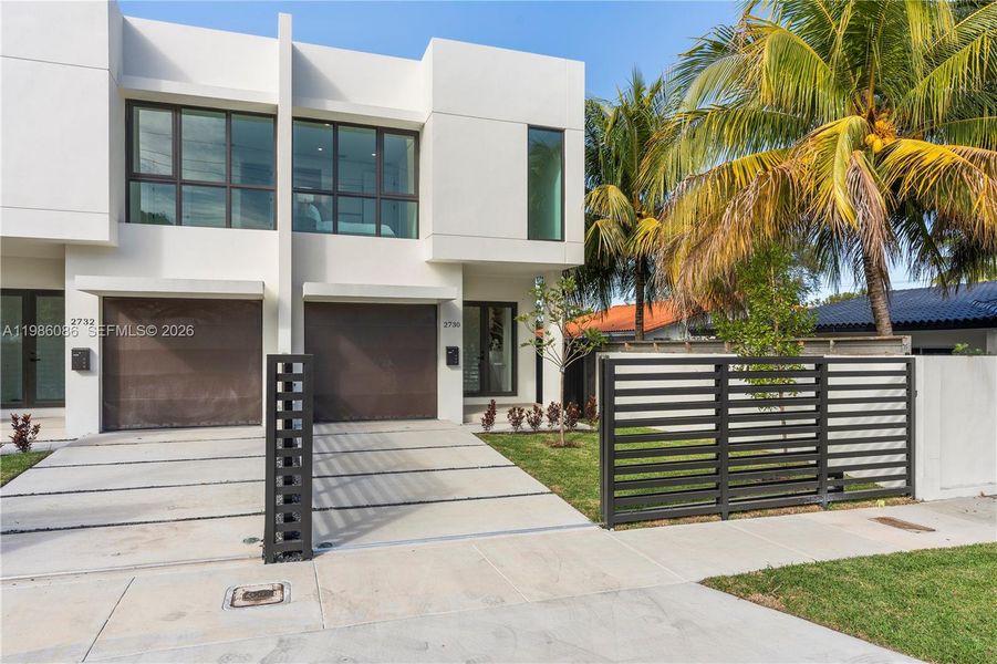 Front exterior of a new home in , Miami, FL, highlighting curb appeal (Image 26). Front exterior of a new home in , Miami, FL, highlighting curb appeal (Image 26).