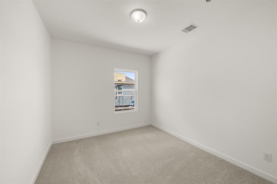 Spacious, unfurnished interior of a new home in The Pointe at Capp Smith Lake, Watauga (Image 34).