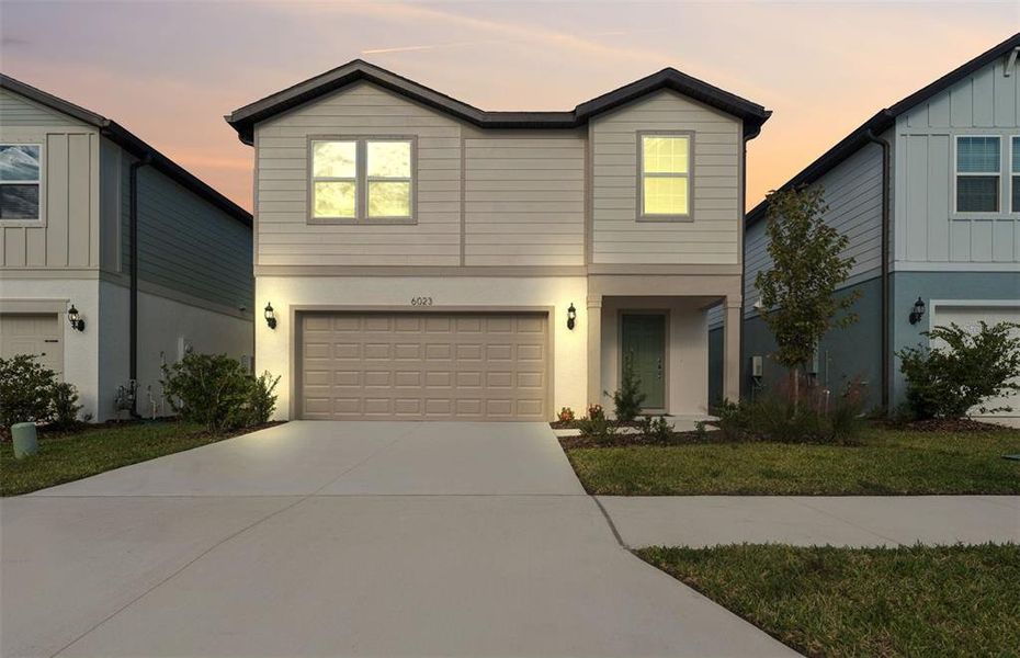 Front exterior of a new home in Waterset, Apollo Beach, FL, highlighting curb appeal (Image 19).