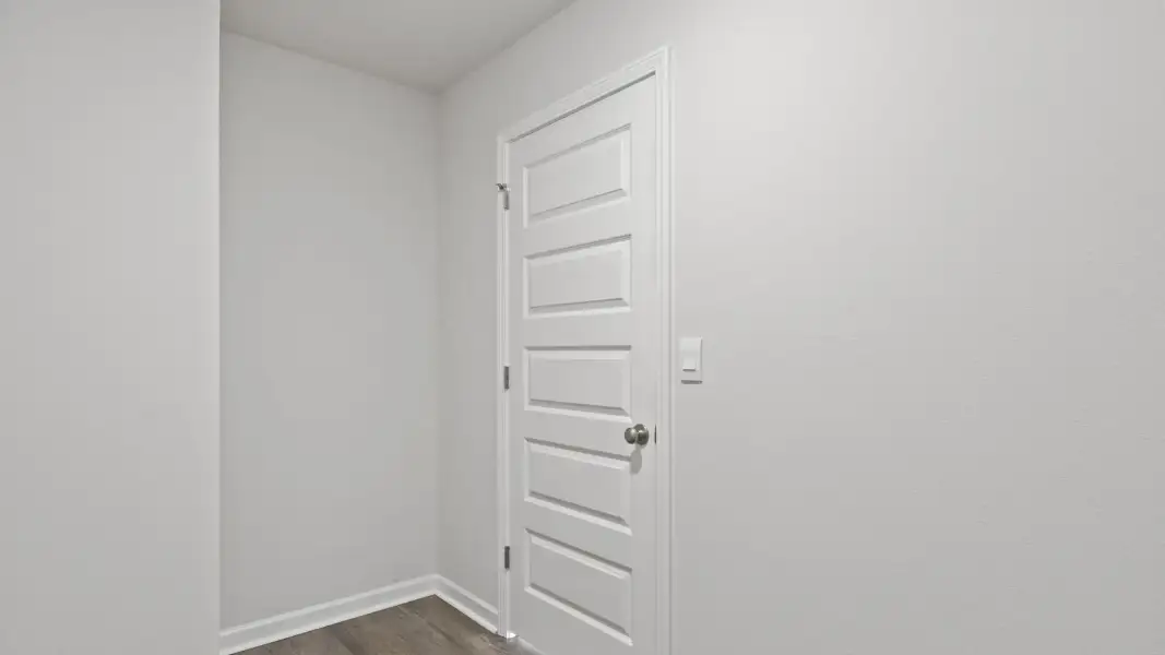 Spacious, unfurnished interior of a new home in Magnolia at the Bluffs Phase 3, Freeport (Image 23).