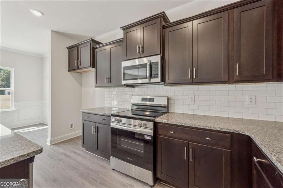 Furnished interior view inside a new home in Park Place, Bowdon (Image 6).