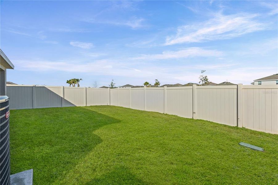 Exterior details and patio area of a home in Silverstone North, Palmetto (Image 3).