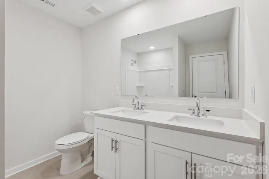 Furnished interior view inside a new home in Running Creek, Locust (Image 6).