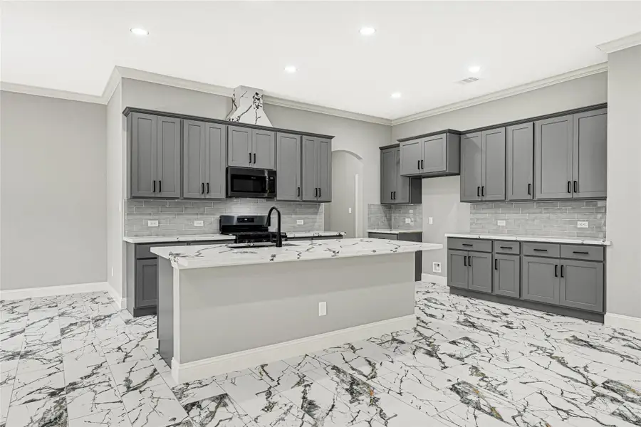 Spacious island seats 4 comfortably. Spacious island seats 4 comfortably.