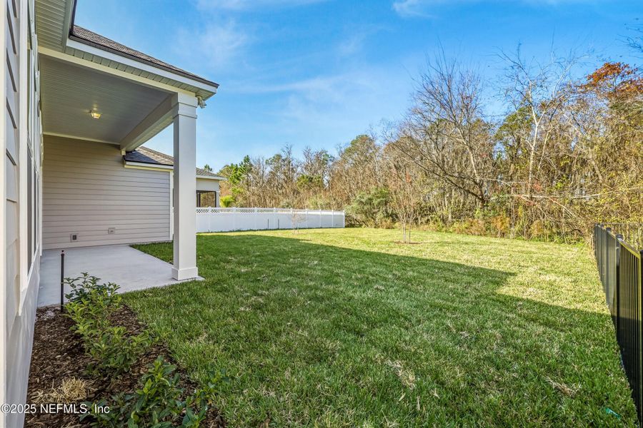Exterior details and patio area of a home in Silver Landing at SilverLeaf, St. Augustine (Image 33).