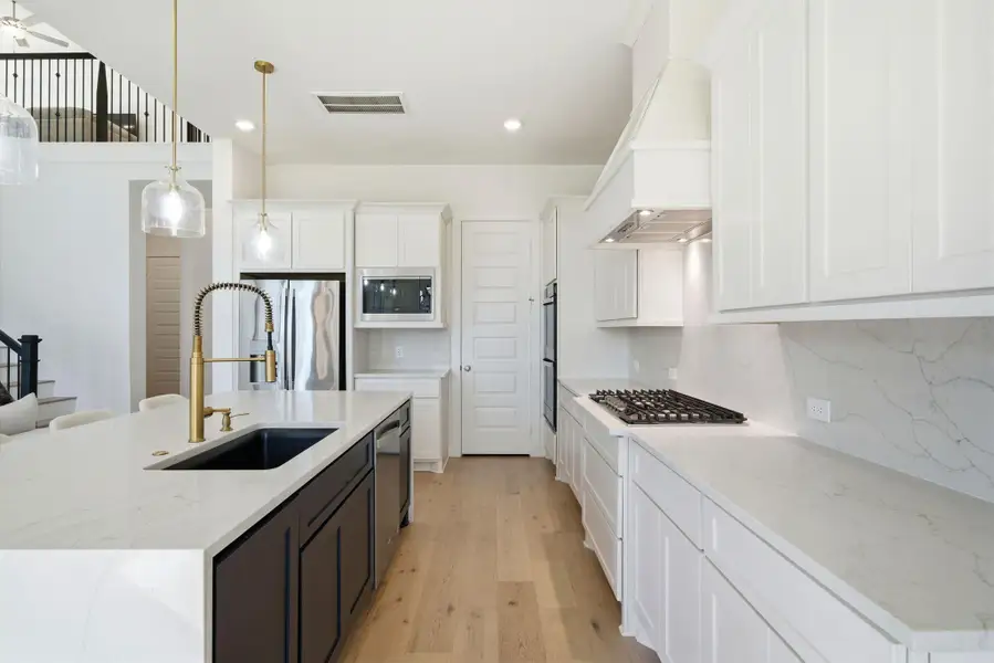 Furnished interior view inside a new home in Sienna, Missouri City (Image 5).