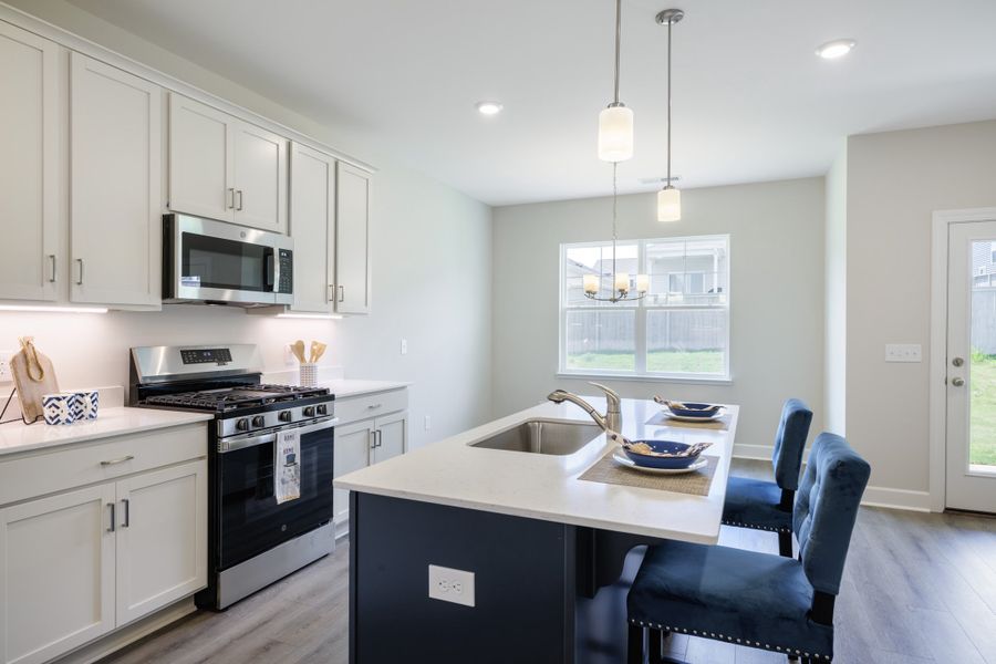 Representative furnished interior of a home built from the The Prescott by Cothran Homes in Holly Ridge, Greenville (Image 11).