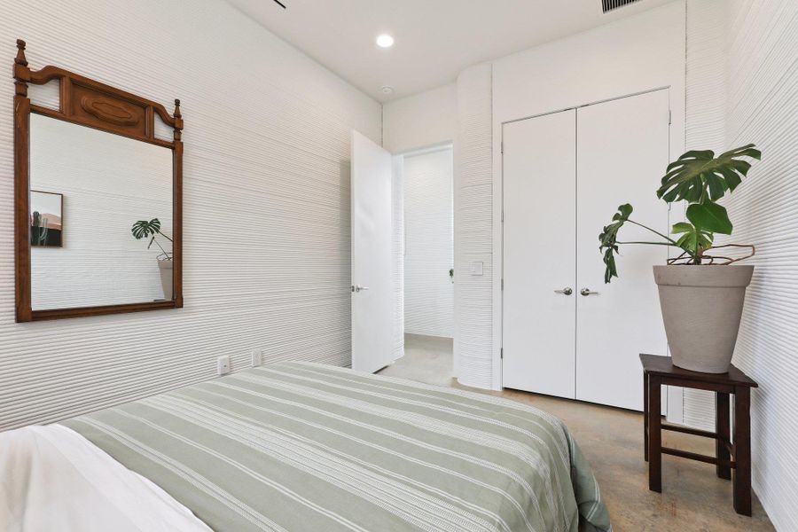 Bedroom featuring a closet and recessed lighting