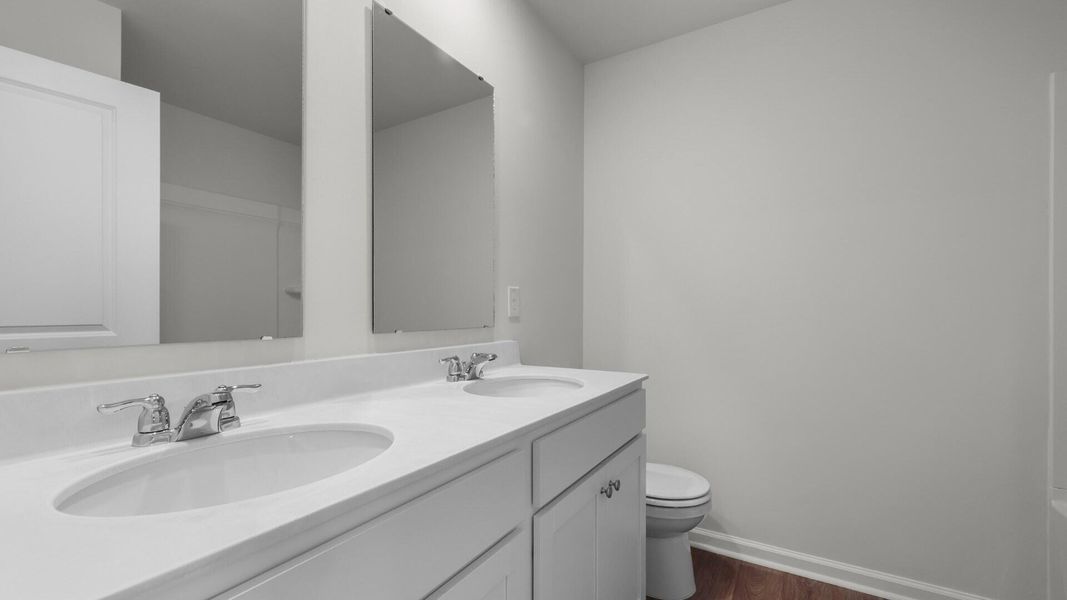 Furnished interior view inside a new home in Pine Hills Townhomes at Cane Bay, Summerville (Image 9).