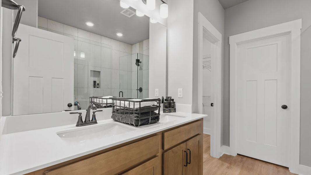 Primary Bathroom of The Middleton Design by DRB Homes