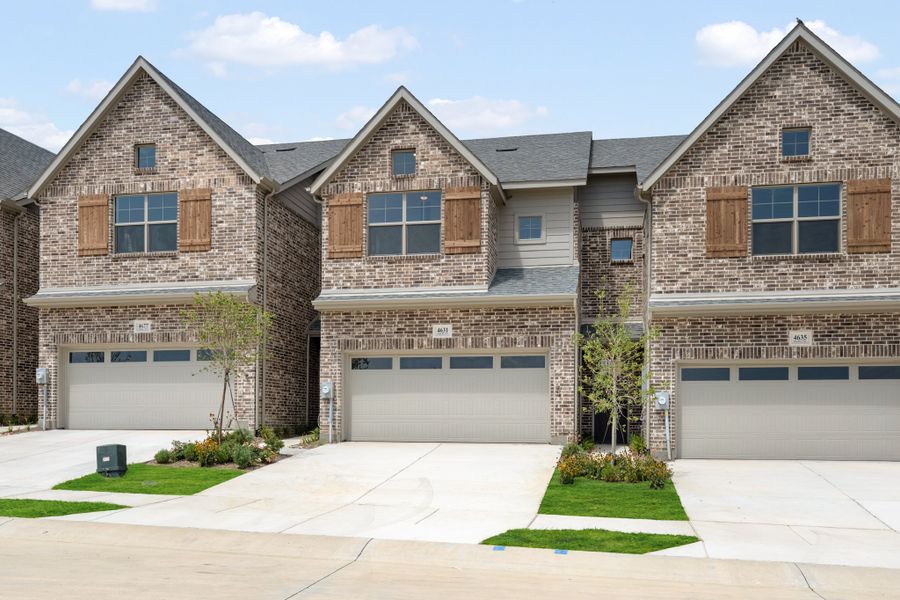 Front exterior of a new home in Wildridge, Oak Point, TX, highlighting curb appeal (Image 26). Front exterior of a new home in Wildridge, Oak Point, TX, highlighting curb appeal (Image 26).