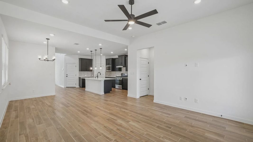 Representative unfurnished interior of a home built from the Sage by Chesmar Homes in Legacy at Lake Dunlap, New Braunfels (Image 11). Representative unfurnished interior of a home built from the Sage by Chesmar Homes in Legacy at Lake Dunlap, New Braunfels (Image 11).