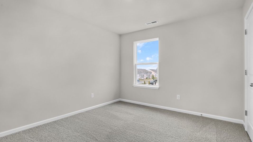 Spacious, unfurnished interior of a new home in The Reserve at Prestleigh, Wake Forest (Image 21).