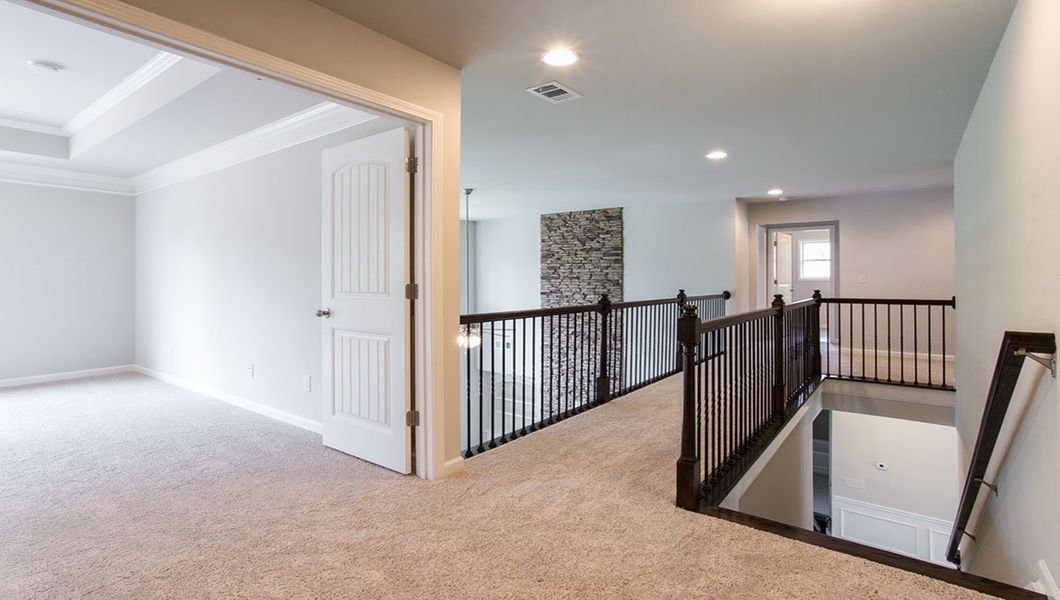 Representative furnished interior of a home built from the Edinburgh by D.R. Horton in Thalley Creek Estates, Cumming (Image 9).