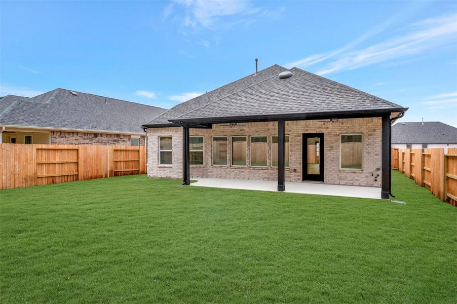 Exterior details and patio area of a home in Sorella, Tomball (Image 21).