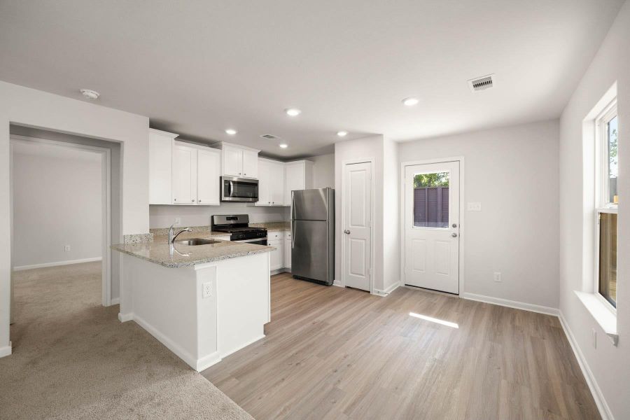 Furnished interior view inside a new home in Vacek Country Meadows, Richmond (Image 7).