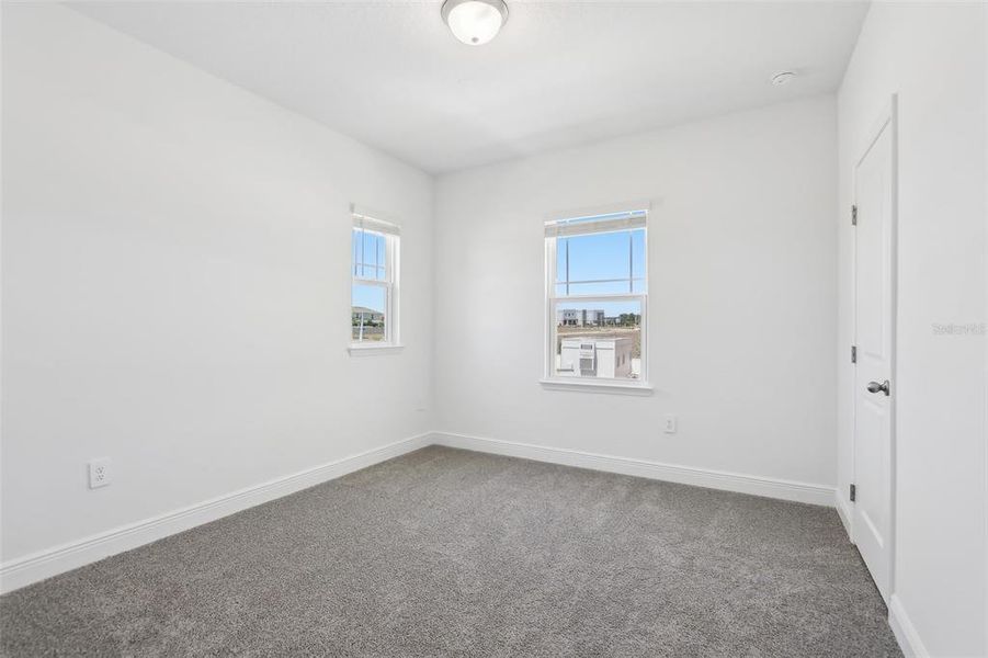 Spacious, unfurnished interior of a new home in Cyrene at Minneola - Villas, Montverde (Image 19).