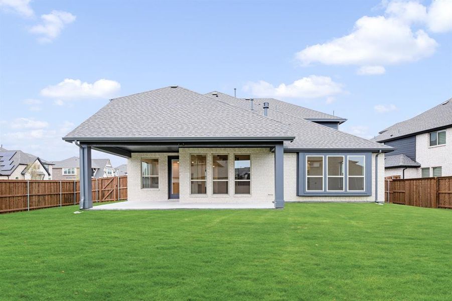 Exterior details and patio area of a home in Windsong Ranch Classic 61, Prosper (Image 4). Exterior details and patio area of a home in Windsong Ranch Classic 61, Prosper (Image 4).
