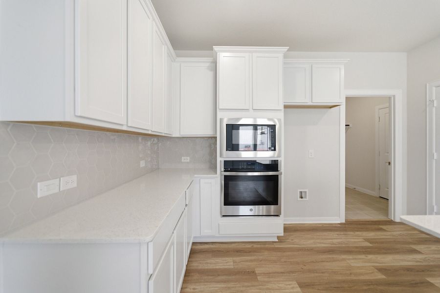 Furnished interior view inside a new home in La Terra, Celina (Image 9).