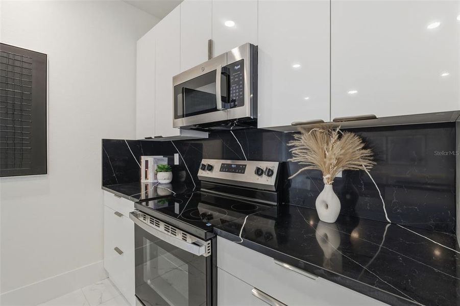 Furnished interior view inside a new home in , Port Charlotte (Image 14). Furnished interior view inside a new home in , Port Charlotte (Image 14).