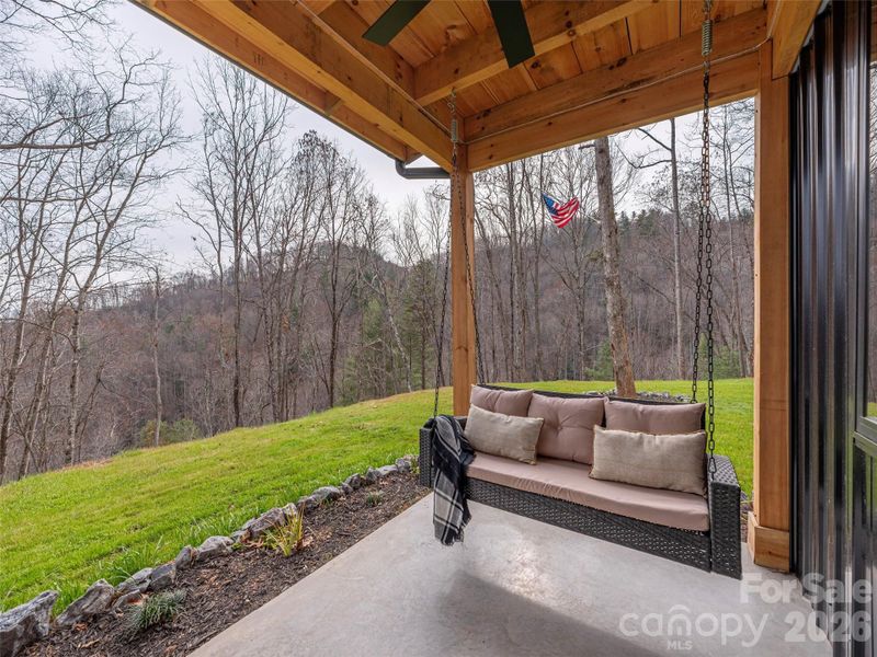 Exterior details and patio area of a home in , Waynesville (Image 19).