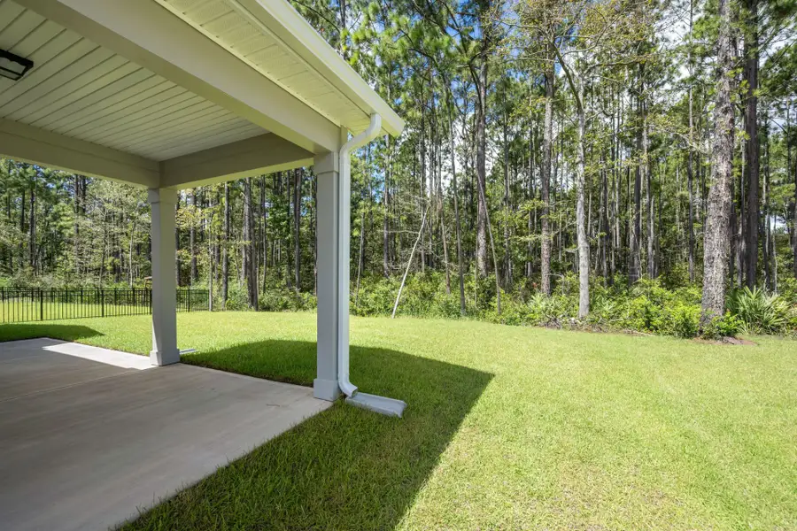 Exterior details and patio area of a home in Waterways, Richmond Hill (Image 35).