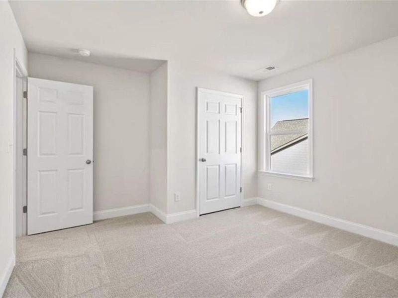 Spacious, unfurnished interior of a new home in Wehunt Meadows, Hoschton (Image 35).
