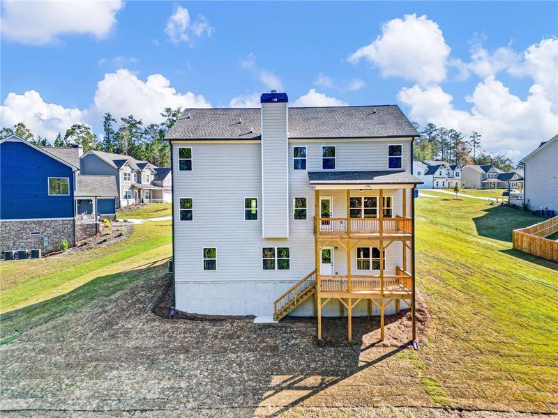 Exterior details and patio area of a home in Woodland Hills, Loganville (Image 3). Exterior details and patio area of a home in Woodland Hills, Loganville (Image 3).