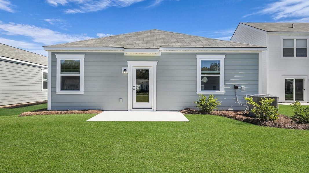 Exterior details and patio area of a home in The Oaks at Center Station, Hollywood (Image 2).