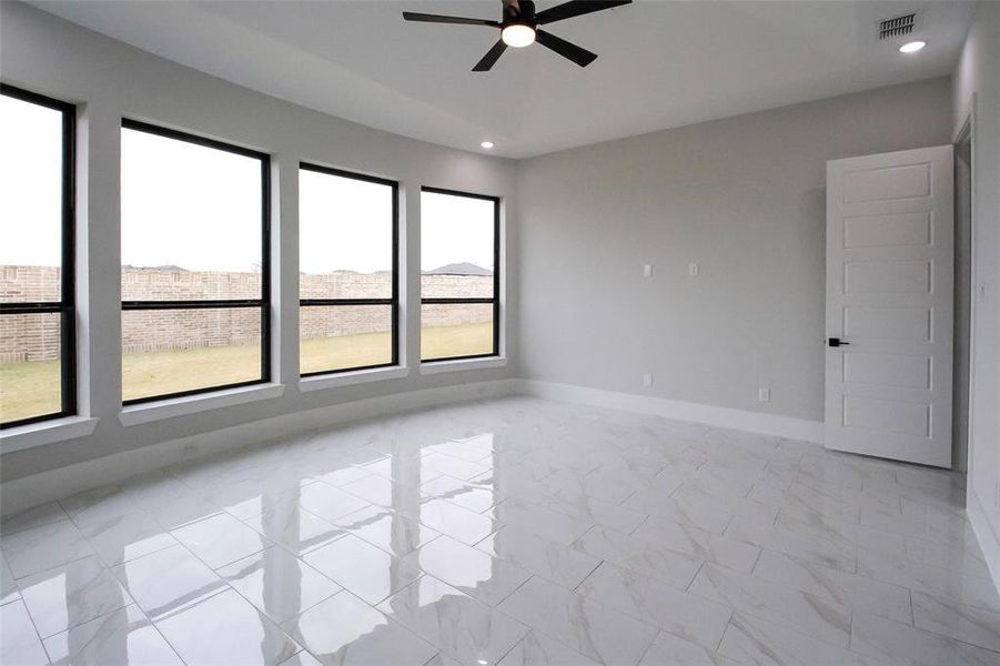 Unfurnished room with ceiling fan